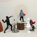 Banksy Flower Thrower & Balloon Girl Resin Sculptures, 0.8 kg Each
