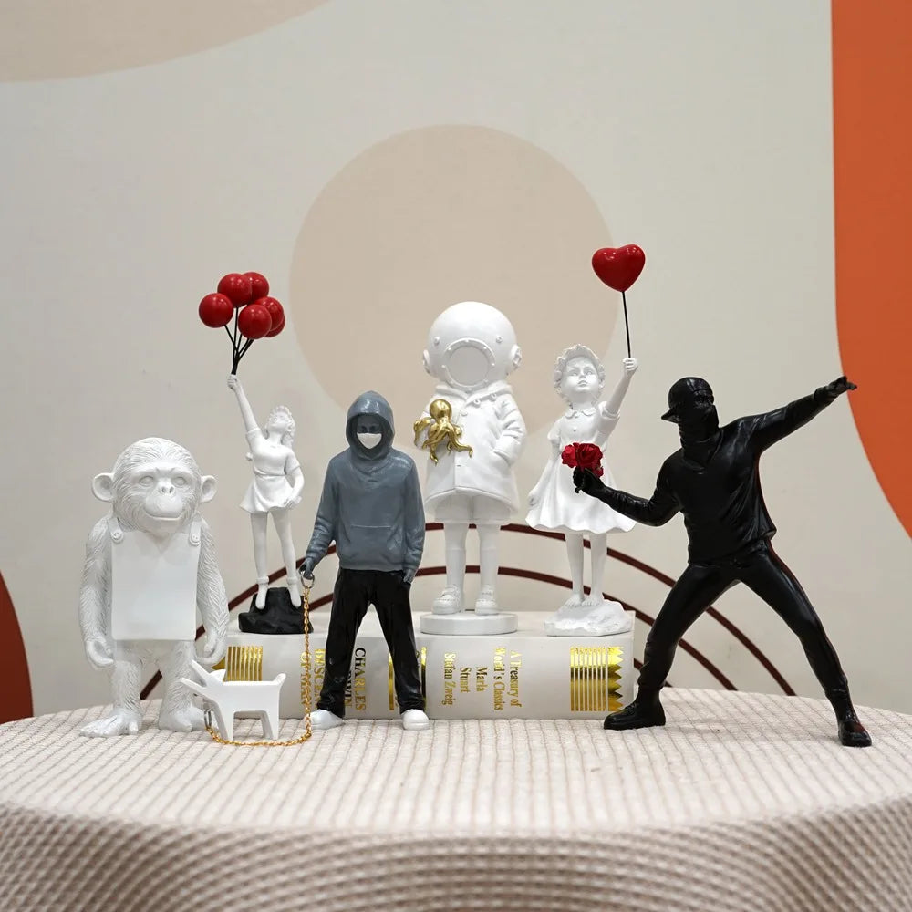 Banksy Flower Thrower & Balloon Girl Resin Sculptures, 0.8 kg Each