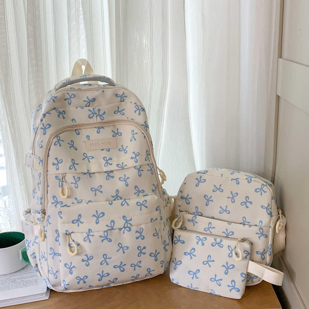 Bow Print Backpack with Multiple Pockets and Padded Shoulder Straps