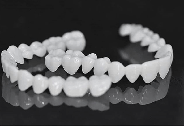 Dental Prosthesis with White Veneers, Lightweight Reusable Resin