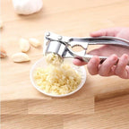 Robust Stainless Steel Garlic Press with Ergonomic Handle for Kitchen Use