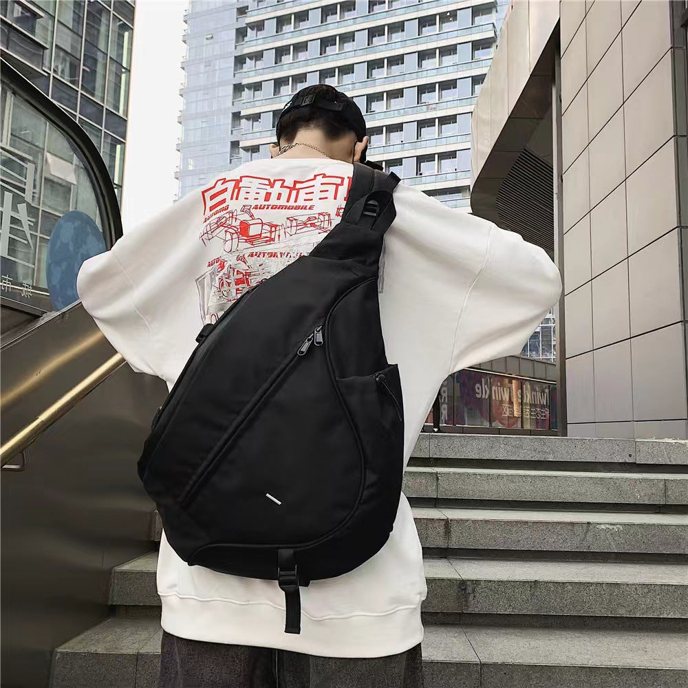 Sling Backpack with Multiple Compartments and Zipped Pockets