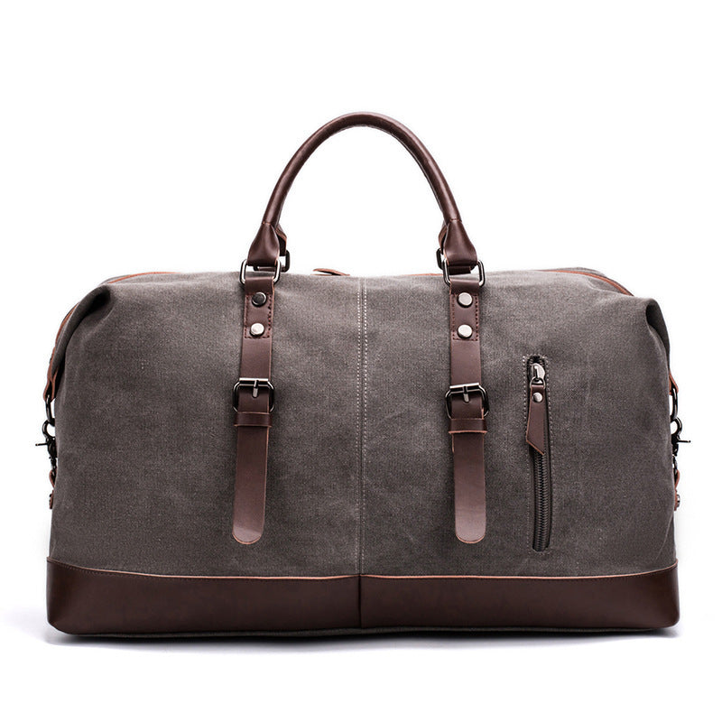 Spacious Canvas and Leather Travel Bag with Adjustable Shoulder Strap