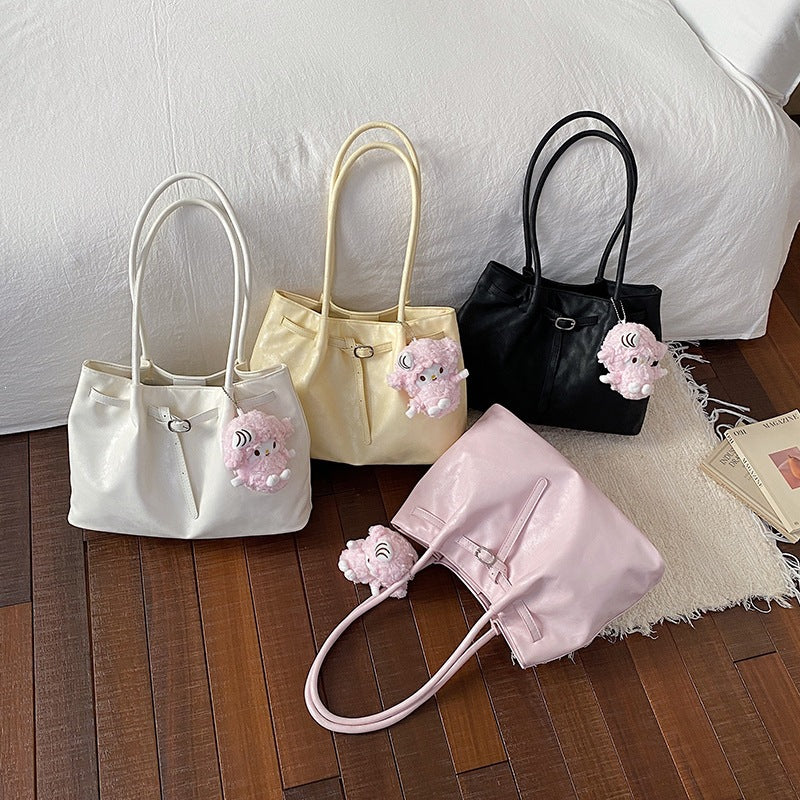 Women’s Casual Faux Leather Tote Bag with Plush Hanging Charm